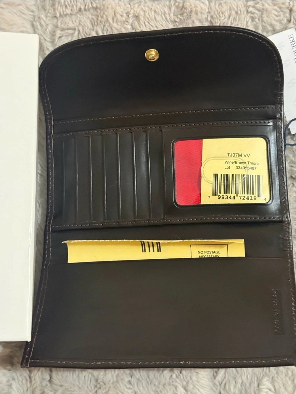 Dooney & Bourke Burgundy Textured Clutch Wallet with Gold Plaque
